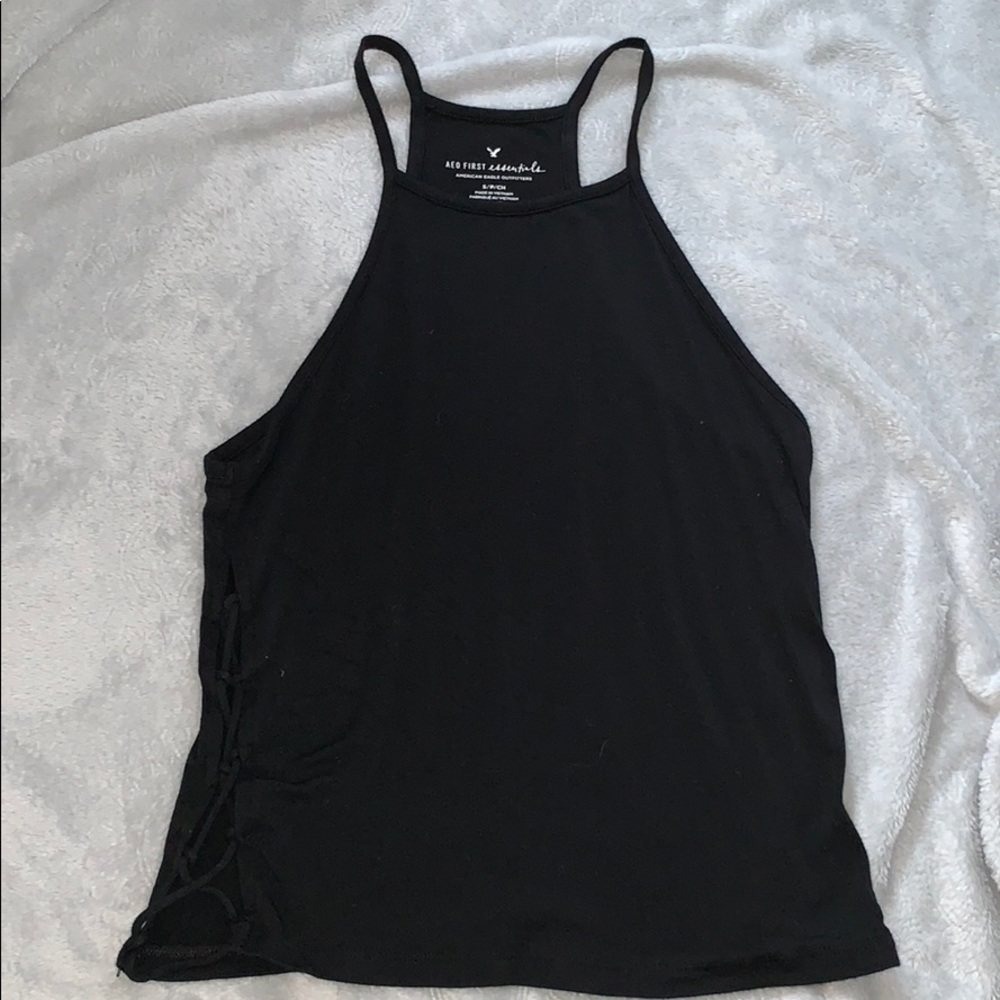 Black shirt with crosses on both sides